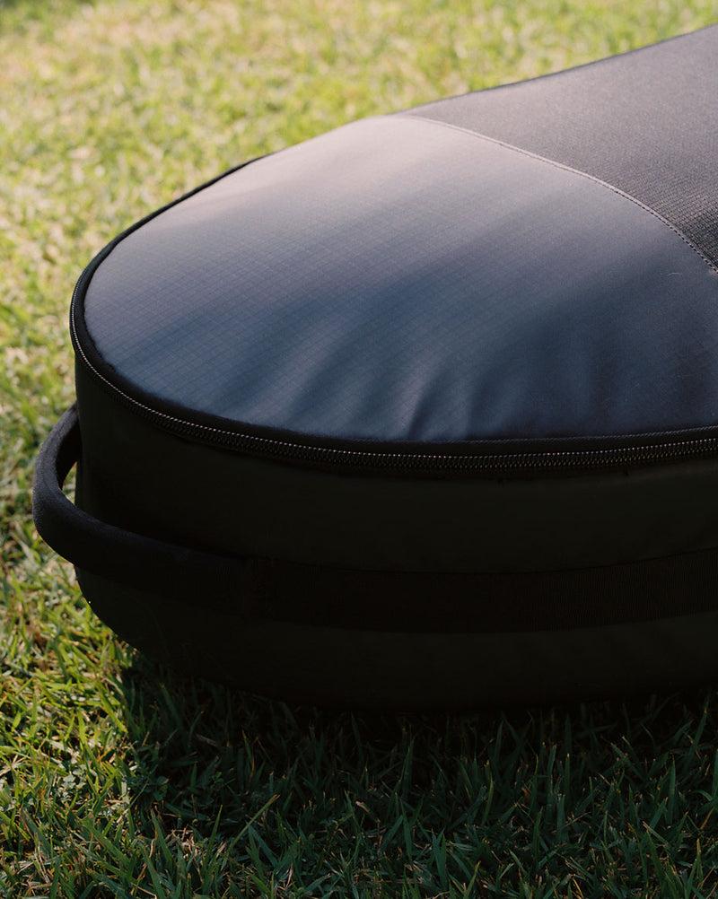 Herschel Supply Co. Surfboard Travel Bag Hybrid 6'6" in Black, designed to fit two surfboards with durable padding and compression straps.