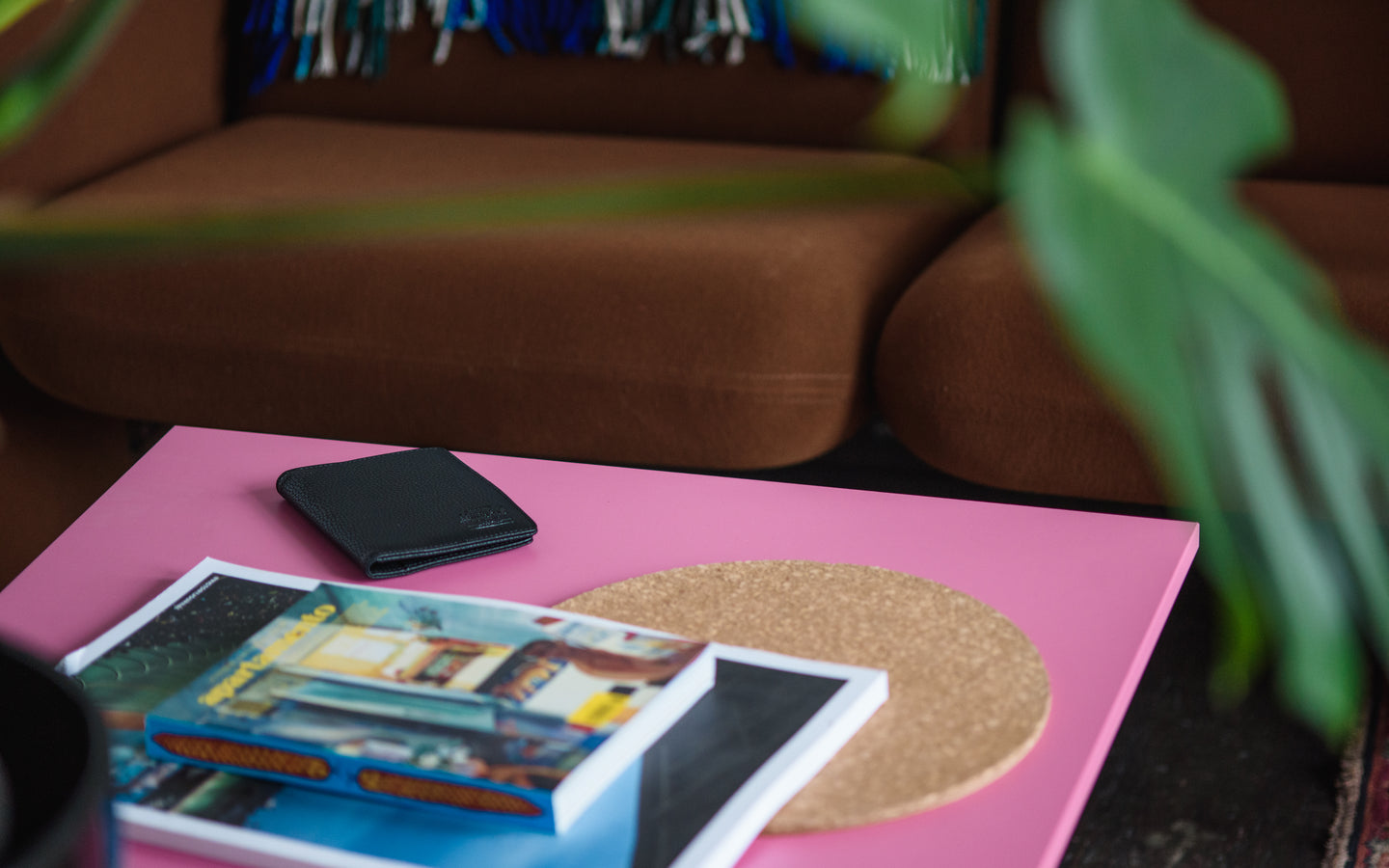 Black pebbled vegan leather Raynor Passport Holder by Herschel Supply Co. with card slots and a passport sleeve.
